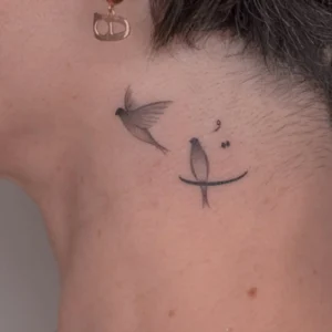 Express Hope and Freedom with This Minimalist Tattoo
