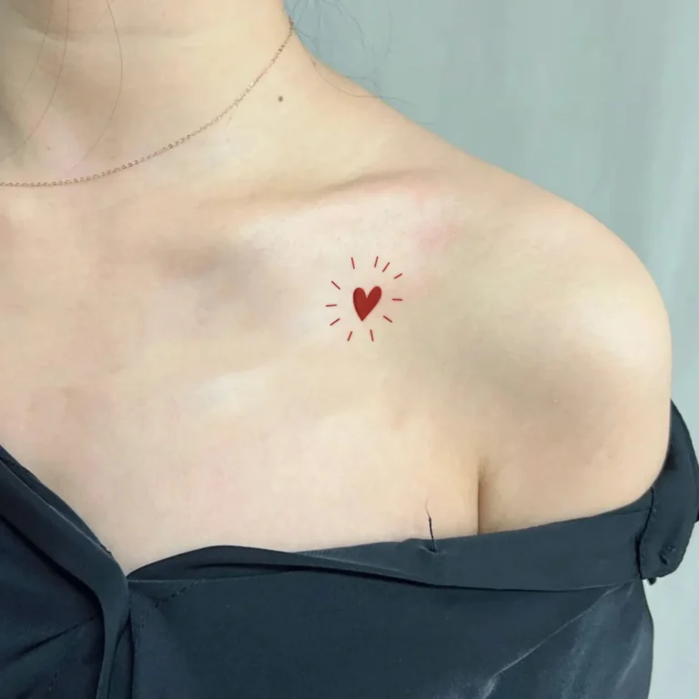 Add Sparkle to Your Style with This Red Heart Tattoo