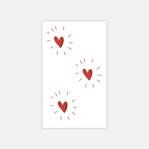 Add Sparkle to Your Style with This Red Heart Tattoo