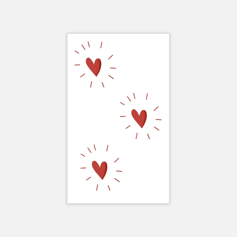 Add Sparkle to Your Style with This Red Heart Tattoo
