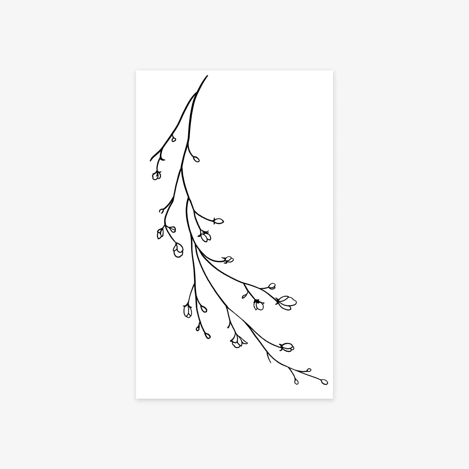 Celebrate Growth with This Delicate Branch & Bud Boho Tattoo