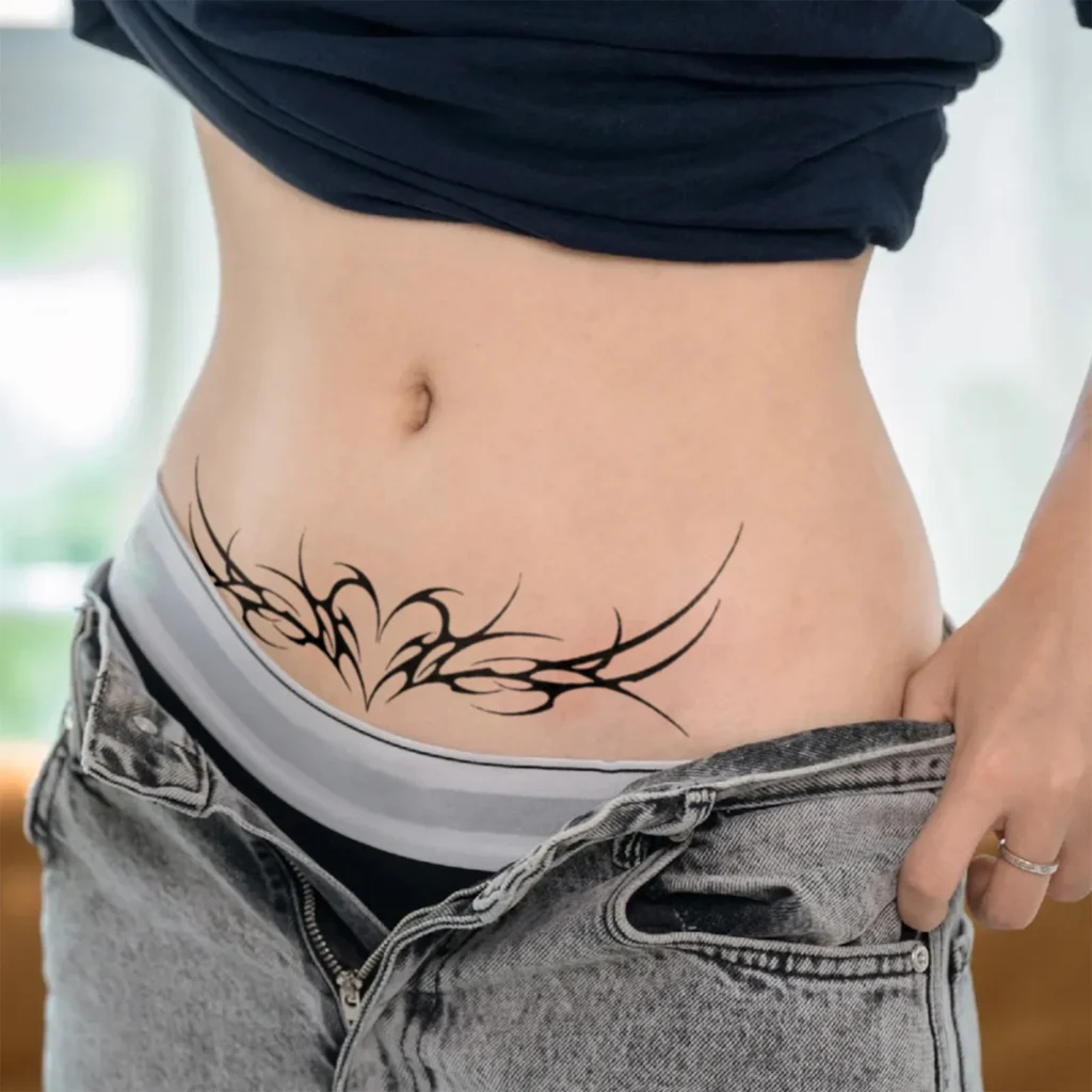 Long tattoos that fade naturally over 7-14 days. Thorn heart and vine design, herbal formula, skin-safe