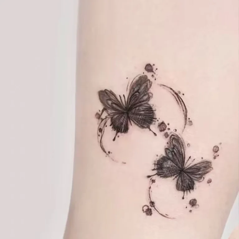 From our tattoos shop: watercolor butterfly design, minimalist and romantic.