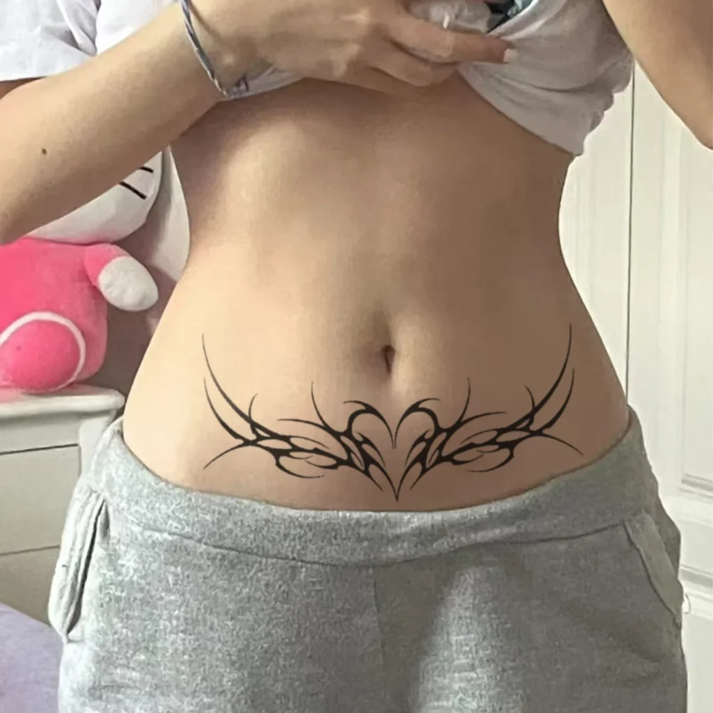 Long tattoos that fade naturally over 7-14 days. Thorn heart and vine design, herbal formula, skin-safe