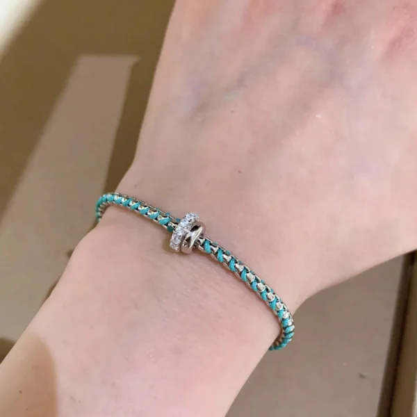 A tennis bracelet with sliding bead charm and vine design. Adjustable, stackable, and perfect for daily wear or gifting. Lightweight and tarnish-resistant.