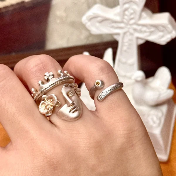 Vintage silver rings for women with a mysterious masquerade mask design. Stackable, gothic, and perfect for daily wear. Available in multiple styles.