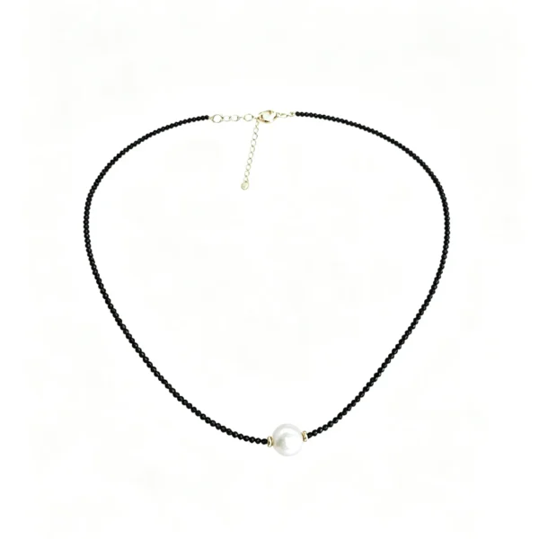 A vintage choker necklace with black pearls and dark crystals. Gothic, elegant, and perfect for everyday wear.