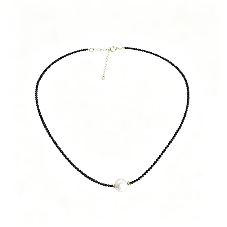 A vintage choker necklace with black pearls and dark crystals. Gothic, elegant, and perfect for everyday wear.