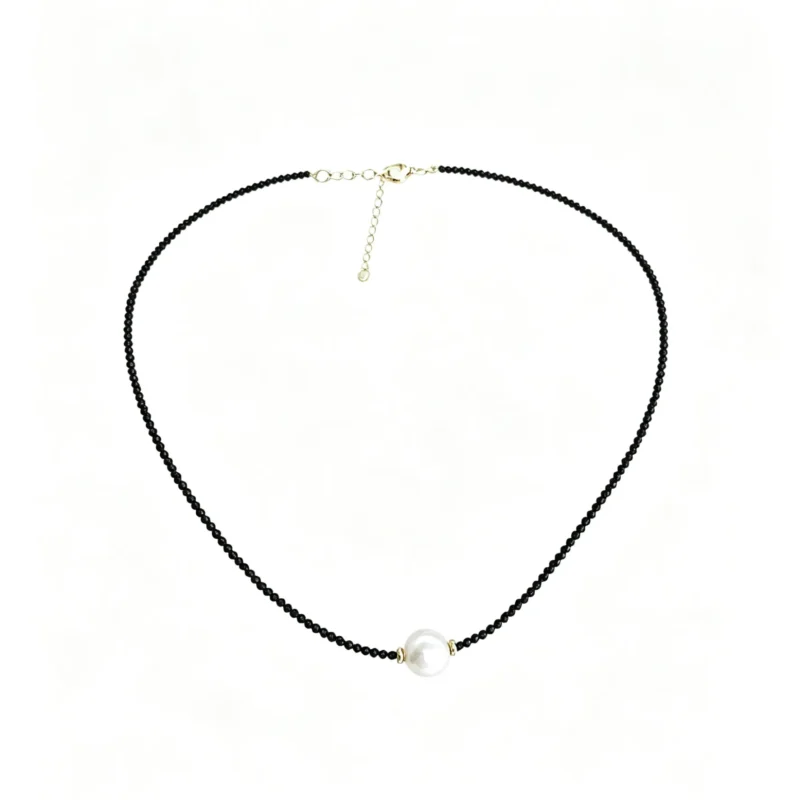 A vintage choker necklace with black pearls and dark crystals. Gothic, elegant, and perfect for everyday wear.