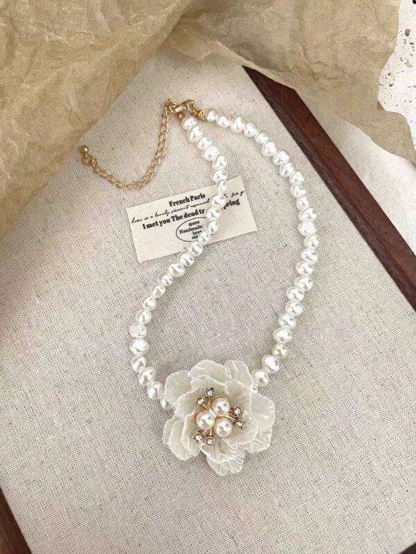 A boho choker necklace with vintage rhinestone charm. Bohemian crystal pendant, adjustable fit. Perfect for festivals or daily wear