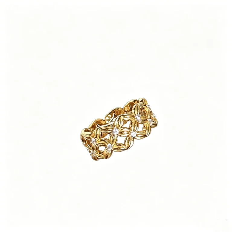 A four leaf clover ring with sparkling cubic zirconia. Adjustable, stackable, and perfect for daily wear or gifting.