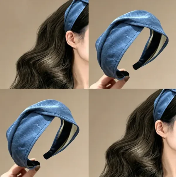 Cross front headband in vintage blue. Twisted leather hair band with high crown lift. One size fits most. Perfect for retro looks.