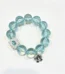Mint green bracelet with beaded stretch design. Fresh summer wrist accessory for women. Lightweight and stackable.