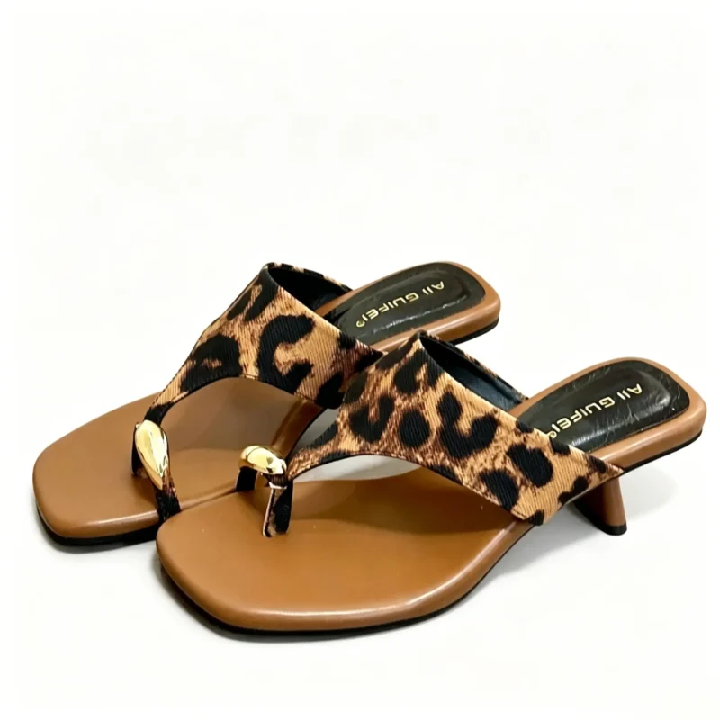 Square toe heels with low chunky heel and toe loop design. Vintage slide sandals for summer. Available in Black, White, Silver, and Leopard
