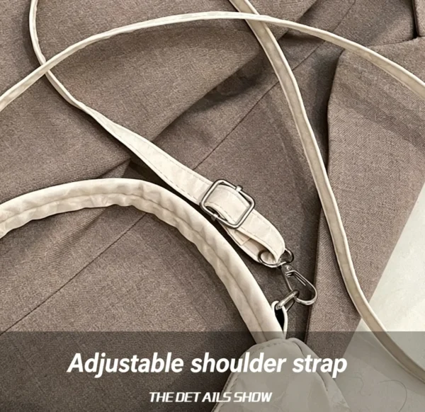Bow shaped crossbody bag in structured bow silhouette. Cute mini PU leather purse. Fits phone and essentials.