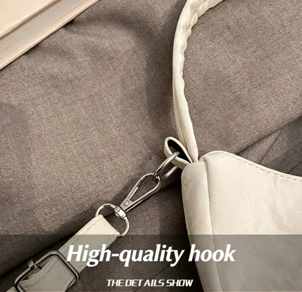 Bow shaped crossbody bag in structured bow silhouette. Cute mini PU leather purse. Fits phone and essentials.