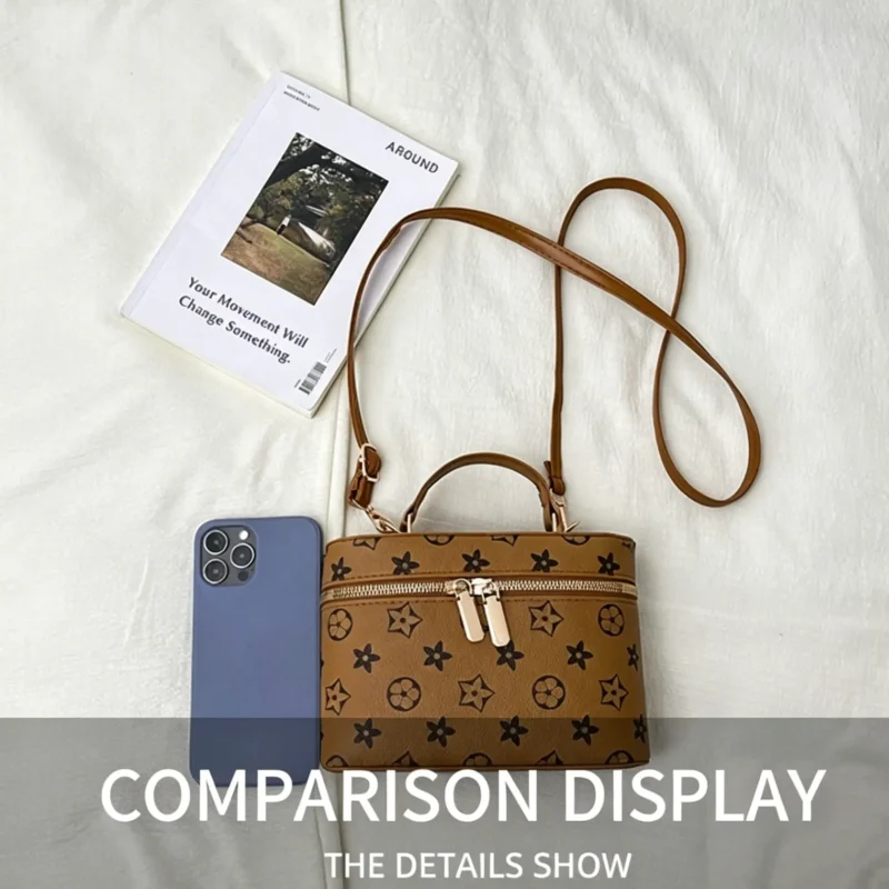 Monogram shoulder bag with classic print. Small designer style vintage PU purse. Lightweight and versatile.