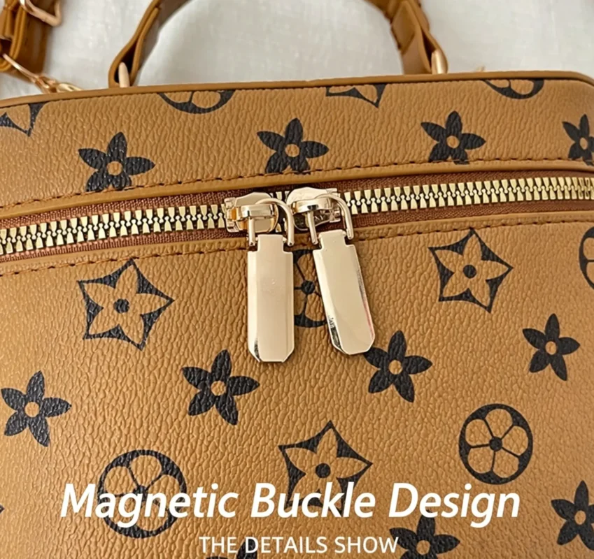 Monogram shoulder bag with classic print. Small designer style vintage PU purse. Lightweight and versatile.