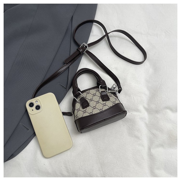 详情_29 Mini satchel bag in shell shape. Small PU leather crossbody purse for women