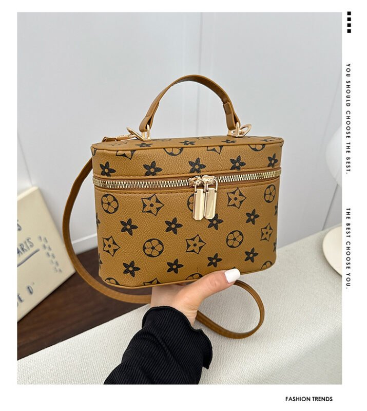 Monogram shoulder bag with classic print. Small designer style vintage PU purse. Lightweight and versatile.