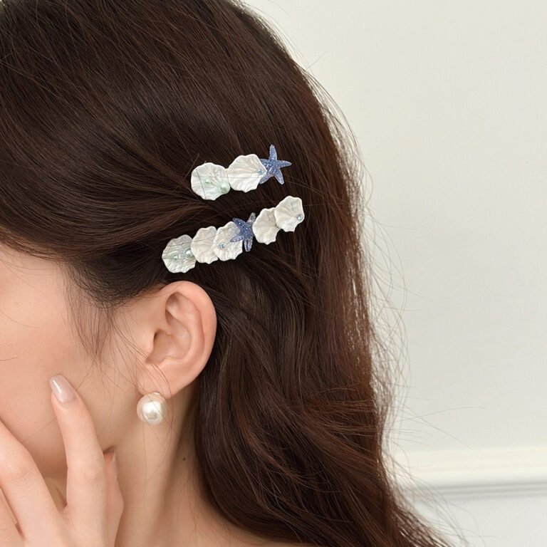 Shell hair clip with starfish design. Beach hair accessory for side bangs. Cute and lightweight. Available in 3 styles.