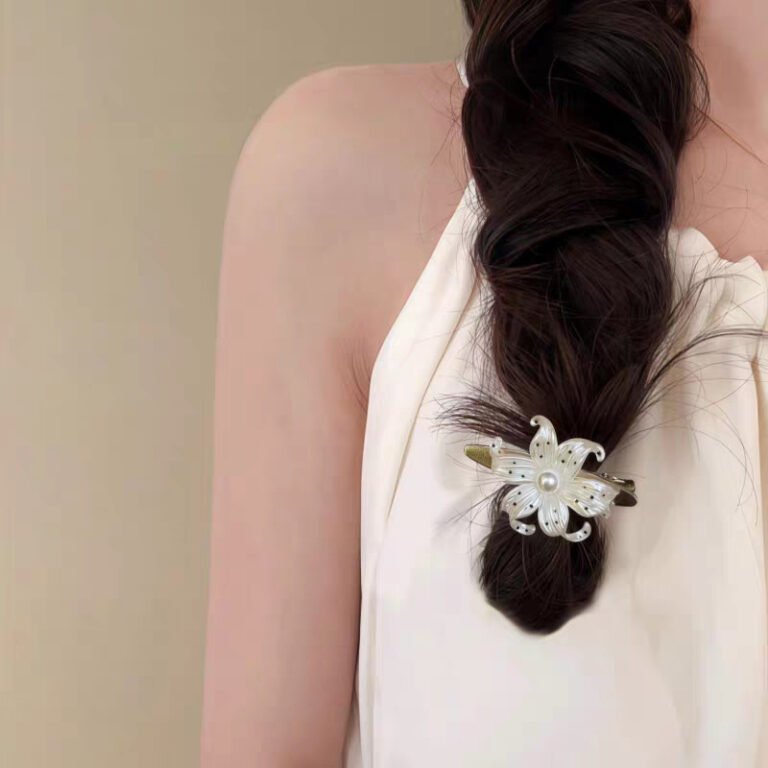 Polka dot hair clip with flower design. Korean side clip for bangs and loose hair. Cute and lightweight.