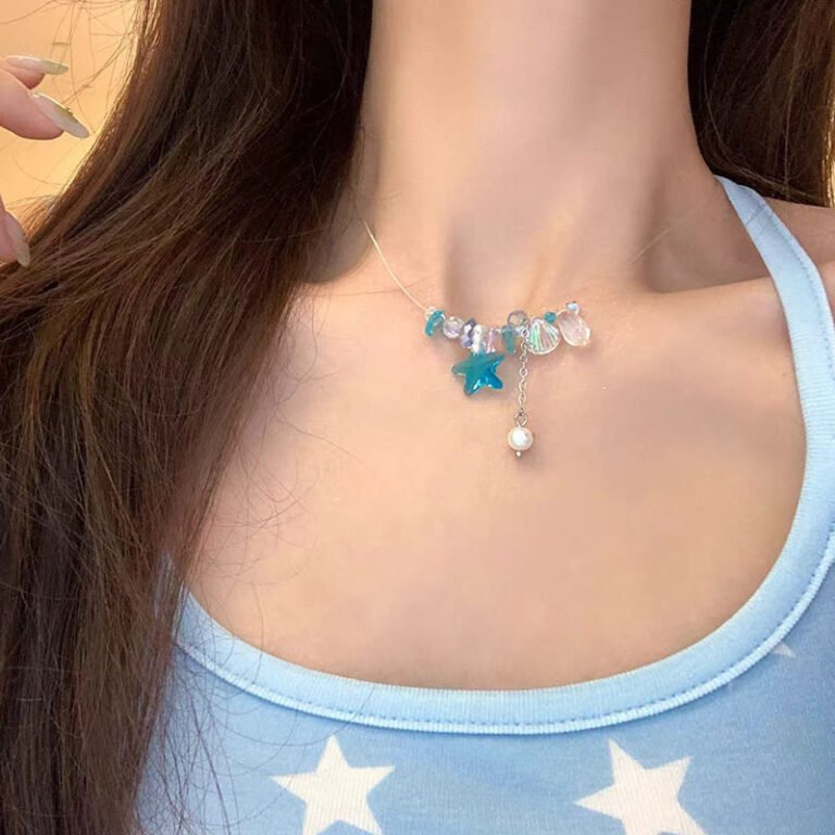 Blue starfish necklace with clear resin pendant. Lightweight minimalist summer choker. Beachy and calming.
