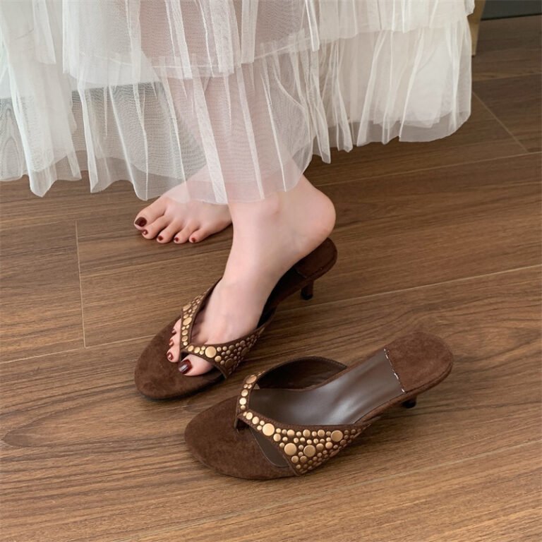 Flat slide sandals with round toe and one band design. Comfortable slip on shoes for daily wear.