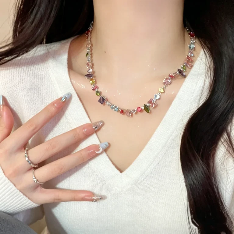 Rainbow crystal necklace and bracelet set with pastel heart shaped gemstones. Sweet colorful jewelry for women.