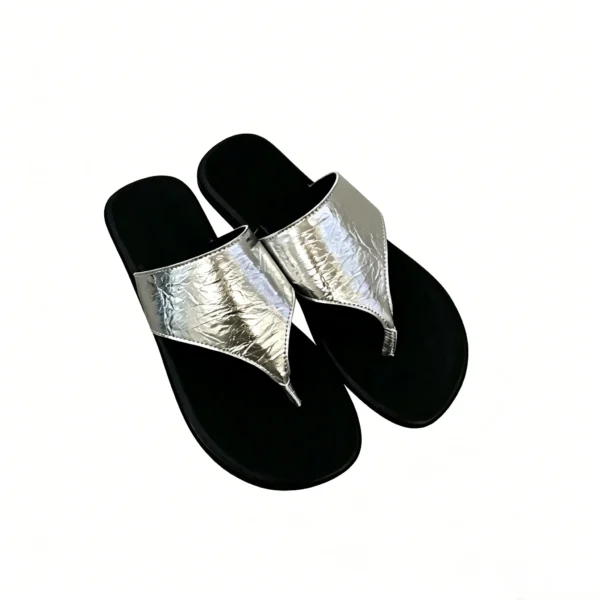Flat toe loop sandals with roman gladiator strap design. Comfortable beach flip flops for summer. Available in Black, Off-white, Brown, and Silver.