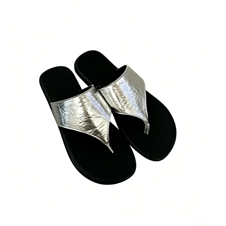 Flat toe loop sandals with roman gladiator strap design. Comfortable beach flip flops for summer. Available in Black, Off-white, Brown, and Silver.