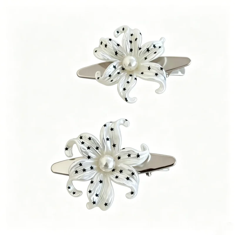 Polka dot hair clip with flower design. Korean side clip for bangs and loose hair. Cute and lightweight.