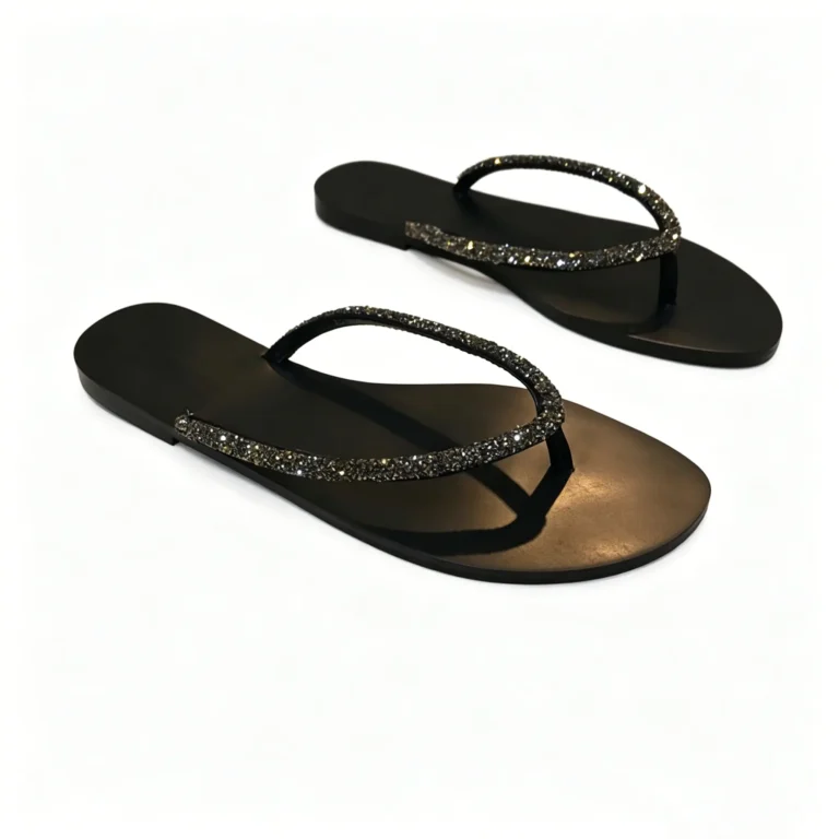 Rhinestone flip flops with flat toe loop design. Jeweled beach sandals for summer. Comfortable and sparkly. Perfect for pool or vacation.